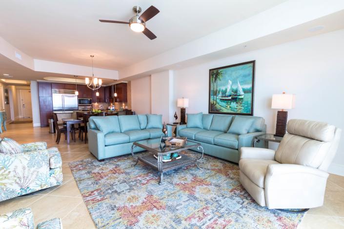 Open floor plan with ample seating in living room